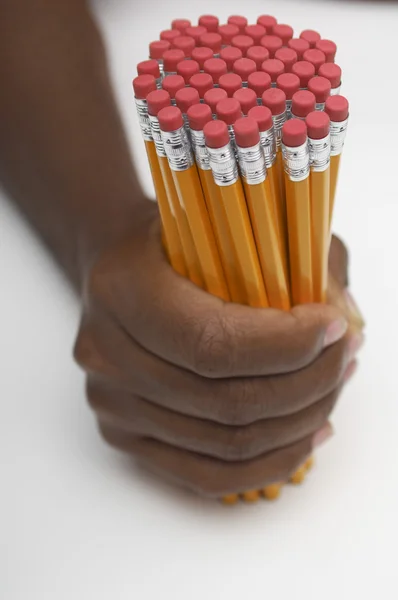 Male hand holding pencils — Stock Photo, Image