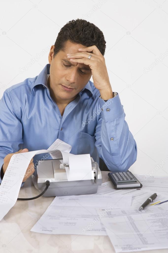 Man Calculating Finances