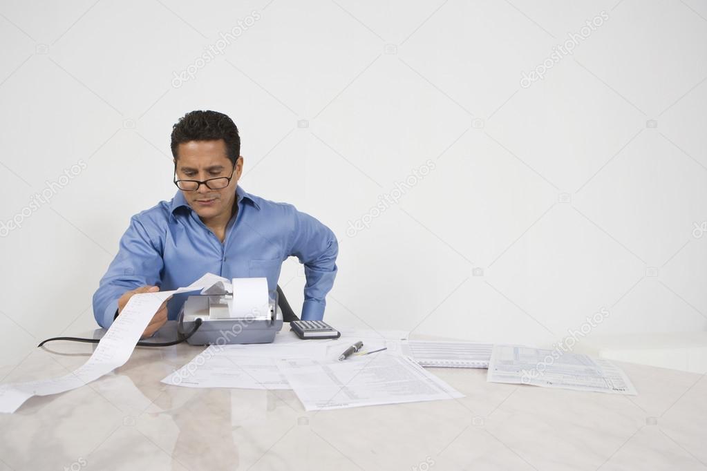 Man Calculating Finances