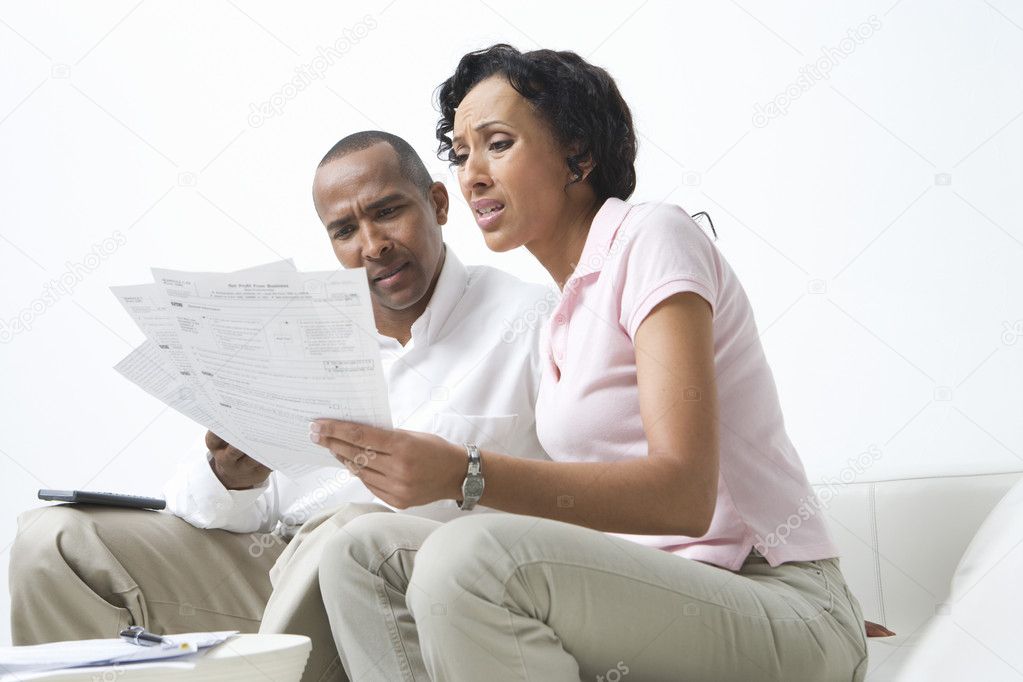 Couple Talking About Bills