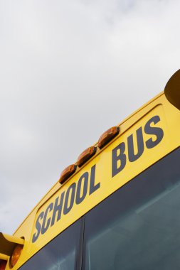School Bus Written Above Windshield clipart