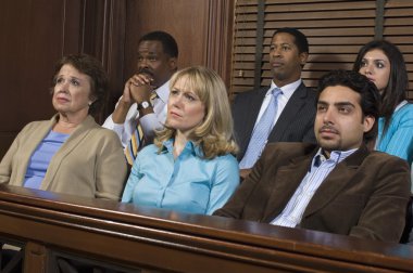 Jurors Sitting In Courtroom During Trial clipart