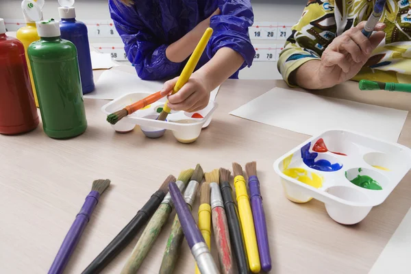 Student med lärare i klass — Stockfoto