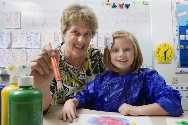 Profesor y estudiante Pintura —  Fotos de Stock