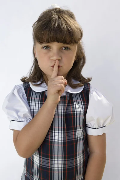 Chica con el dedo en los labios — Foto de Stock