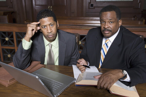 Businessman And Lawyer Sitting Together