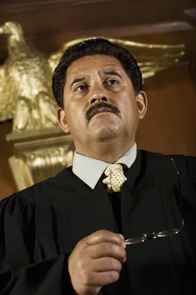 Pensive Judge Holding Glasses — Stock Photo, Image