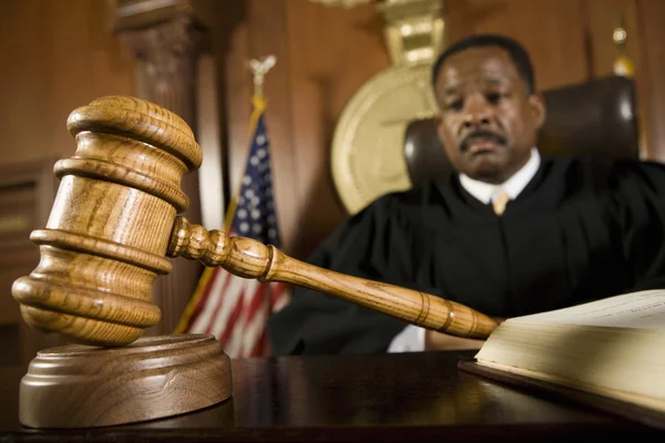 Gavel Lying In Front Of Judge — Stock Photo, Image