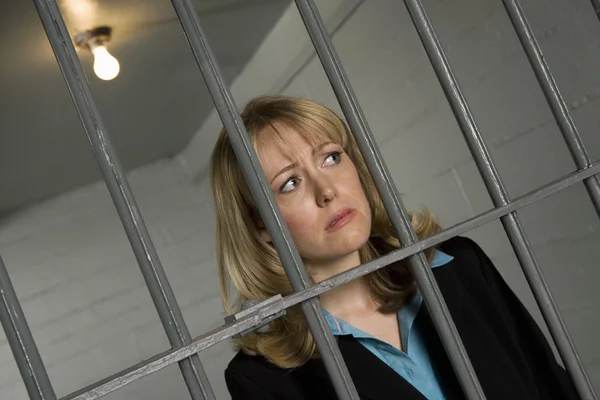 Female Criminal Behind Bars In Jail — Stock Photo, Image