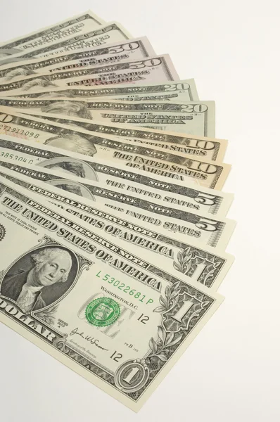 Dollars Arranged Over White Background — Stock Photo, Image