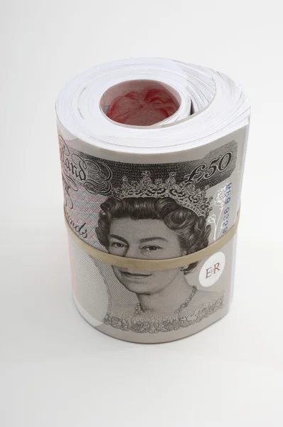 Roll of British paper currency — Stock Photo, Image