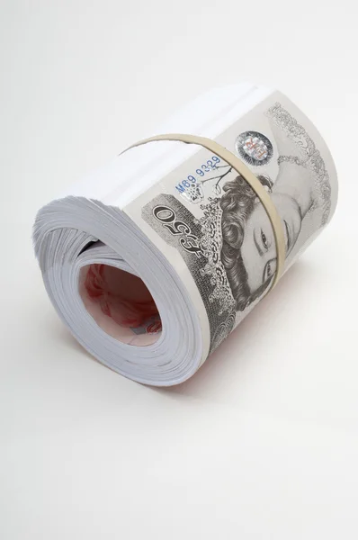 Roll of British paper currency — Stock Photo, Image