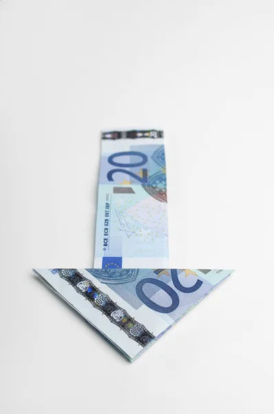 Pfeilschild aus Euro-Schein zeigt nach unten — Stockfoto