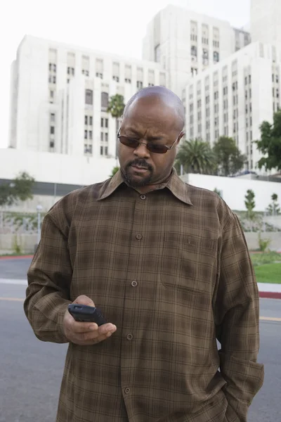 Man Text Messaging On Street — Stock Photo, Image