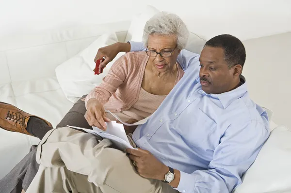 Couple Looking At Bills Worried With Home Finances — Stock Photo, Image