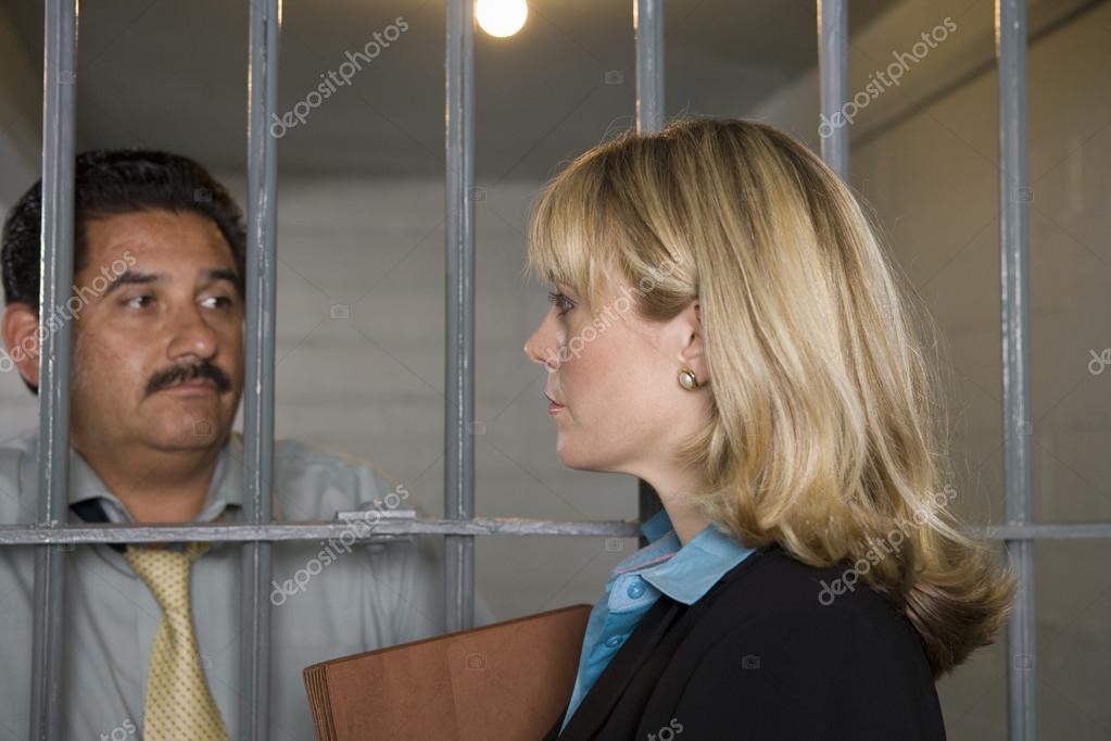 Lawyer With Criminal Behind Bars — Stockfoto © londondeposit 21862165