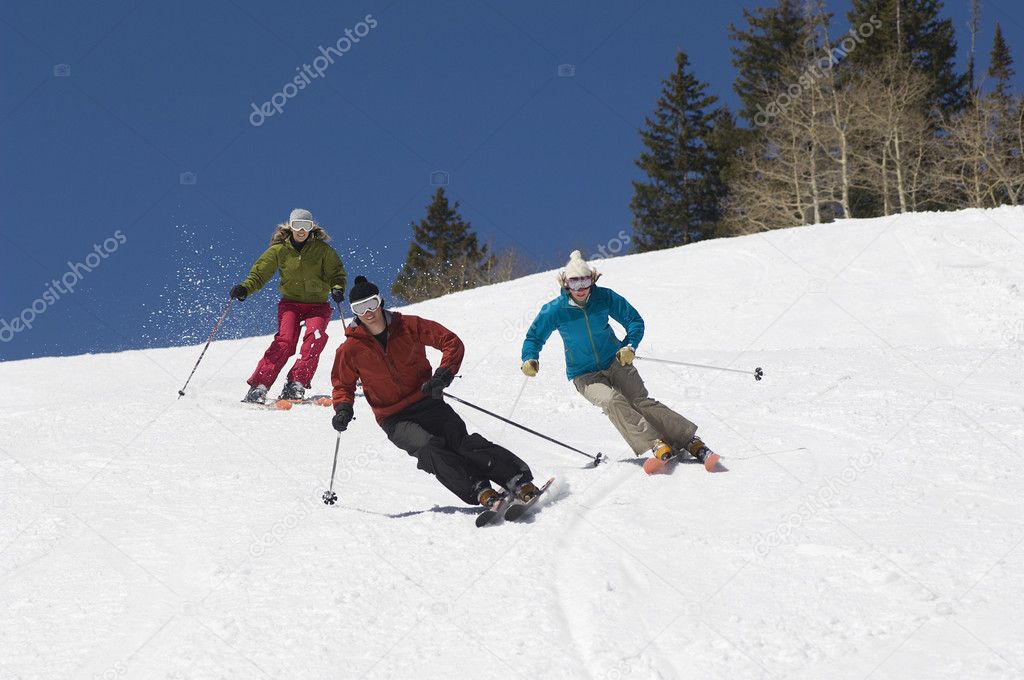 Skiers Skiing Downhill