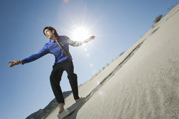 Businessman Surfing Downhill On Briefcase — Stock Photo, Image