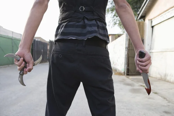 Young Criminal Holding Knife And Glaive — Stock Photo, Image