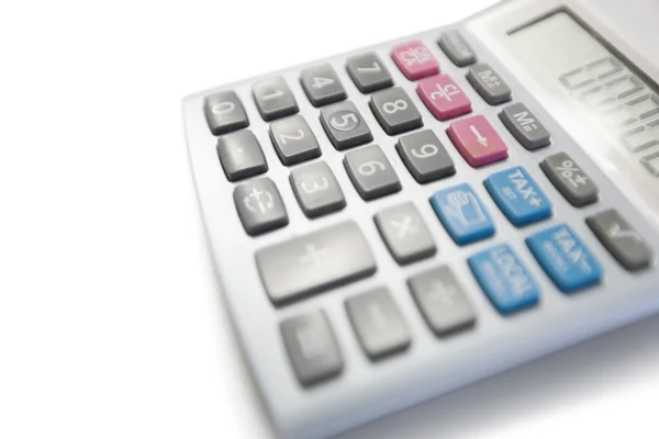 Vista de cerca de la calculadora sobre fondo blanco — Foto de Stock
