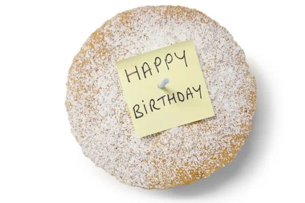 High angle view of 'happy birthday' note on powdered sugar sponge cake — Stock Photo, Image