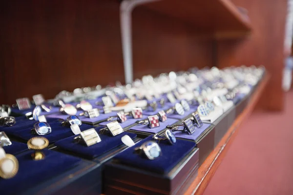 Set of hand cufflinks on display — Stock Photo, Image