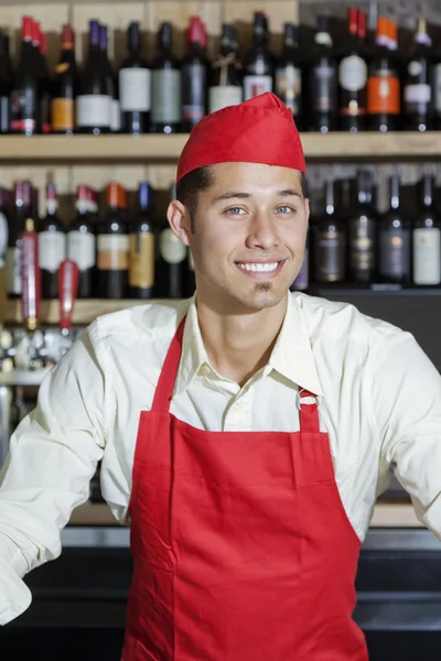 Portrait of a happy bartender in bar — Stock Photo, Image