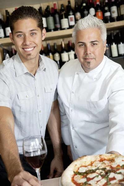 Portrait of happy men with wine glass and pizza — Stock Photo, Image