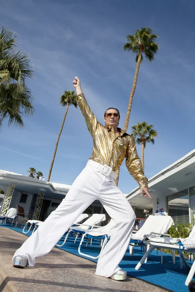 Low angle view of man impersonating Elvis Presley — Stock Image Low angle view of man impersonating Elvis Presley Stock Image