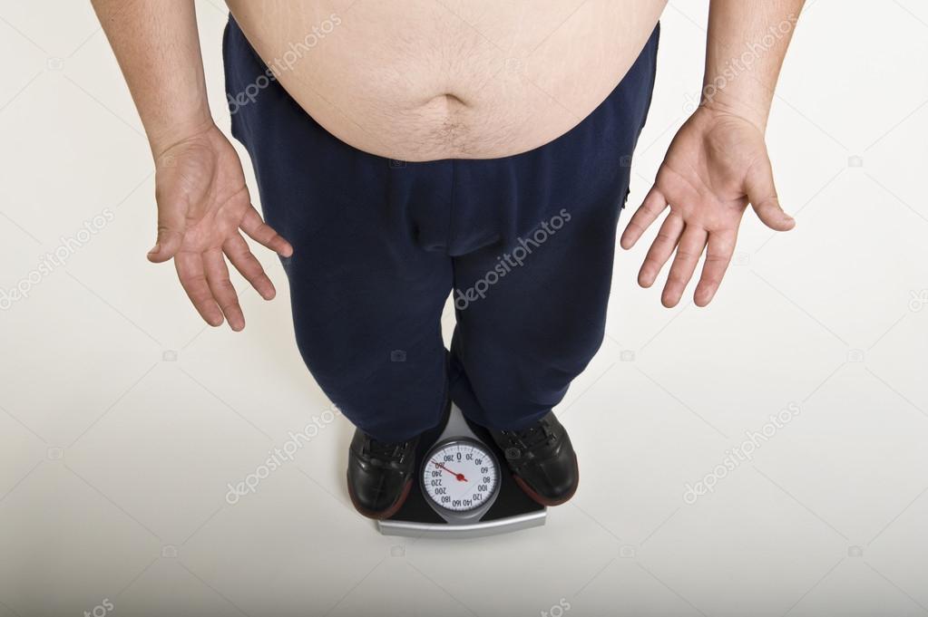 Man Measuring His Weight