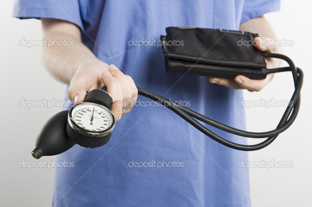 Surgeon With Blood Pressure Gauge