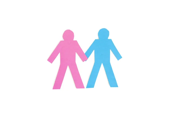 Paper cut out figures holding hands over white background — Stock Photo, Image