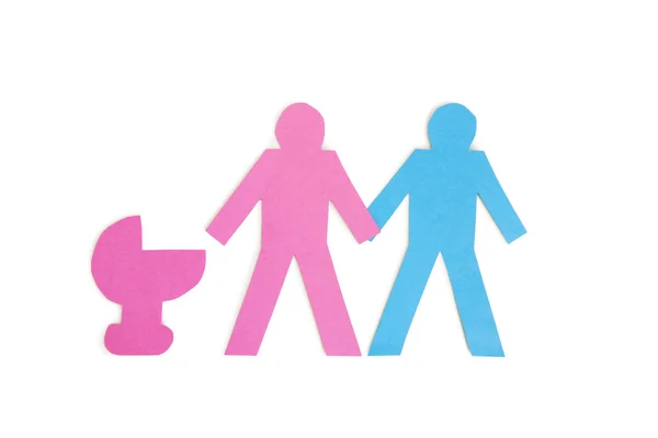 Two stick figures holding hands while standing besides a baby carriage over white background — Stock Photo, Image