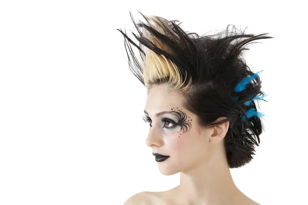 Close-up of beautiful gothic woman with spiked hair and face painting over white background — Stock Photo, Image