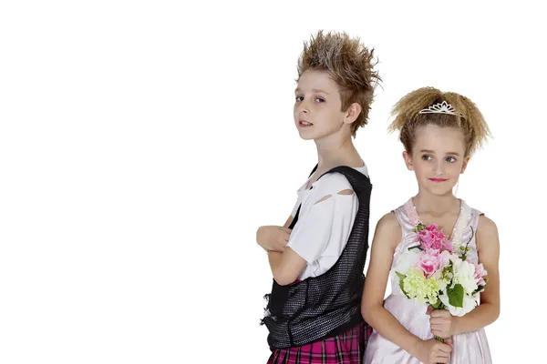 Portrait of punk boy with bridesmaid holding flower bouquet over white background — Stock Photo, Image