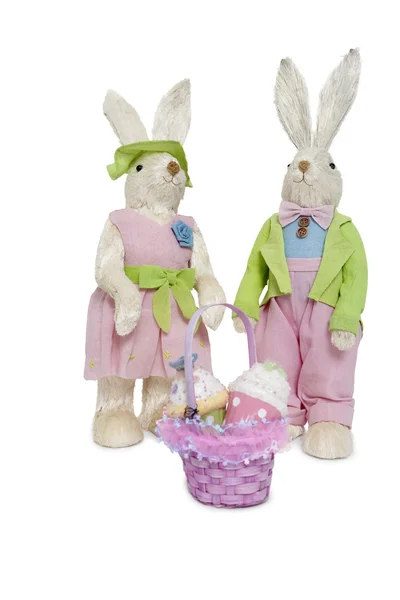 Portrait of stuffed Rabbit couple standing together with basket over white background — Stock Photo, Image