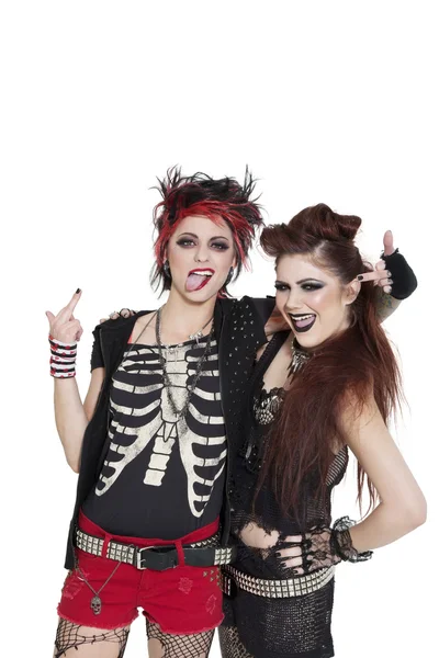 Arrogante punk femmine mostrando dito medio su sfondo bianco — Foto Stock