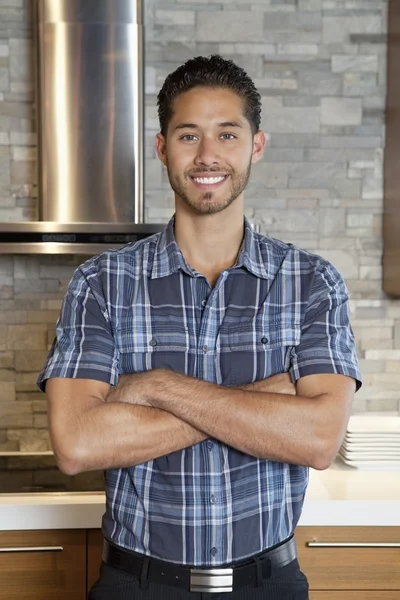 Portrait of a handsome young man with arms crossed — Stock Photo, Image