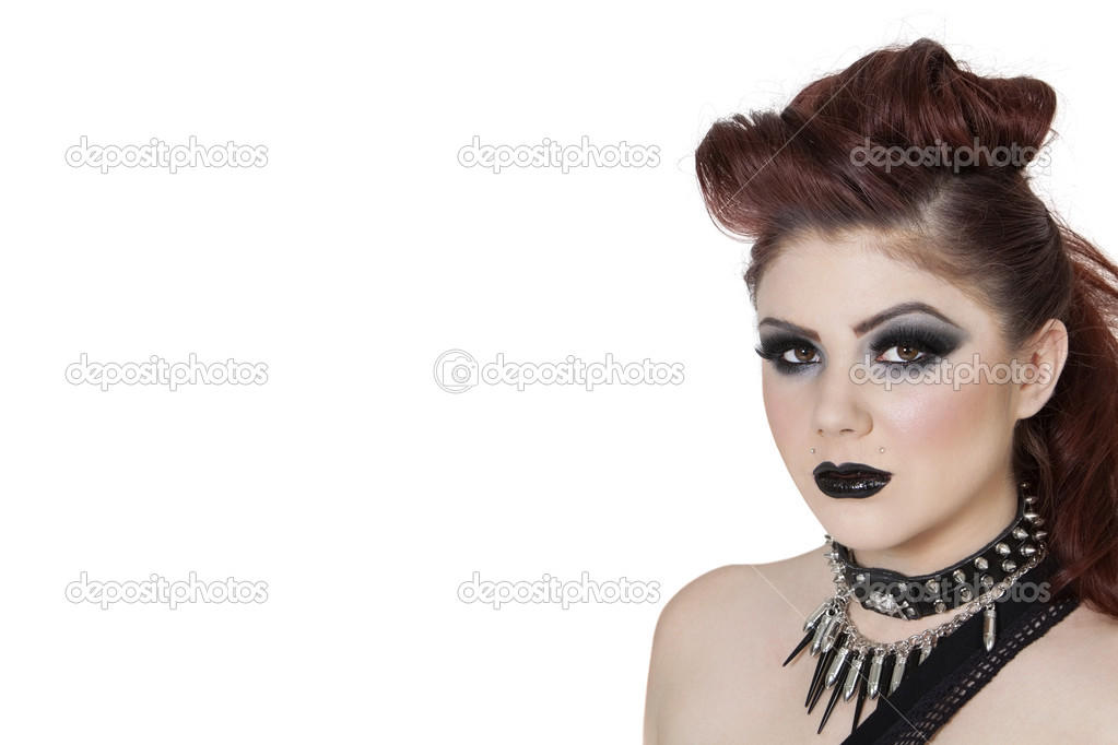 Close-up portrait of a punk woman over white background