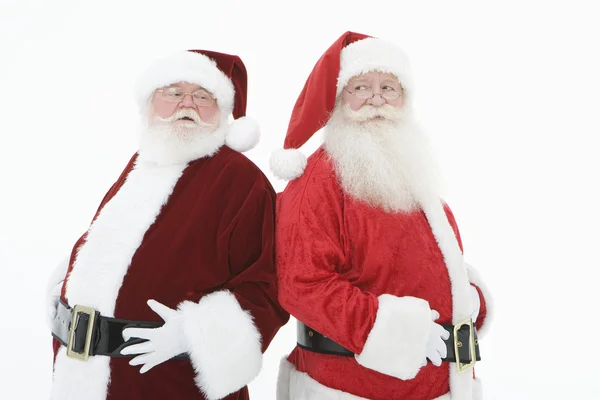 Two Santa Claus Standing Back To Back — Stock Photo, Image