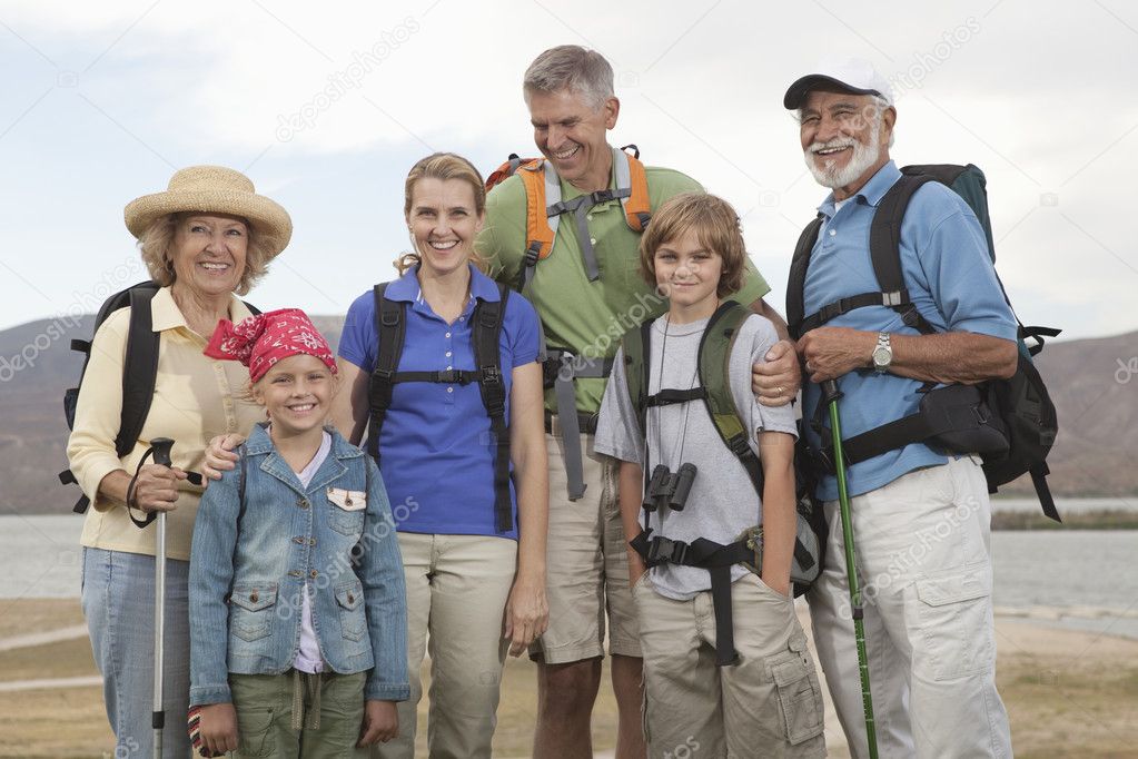 Happy Family With Backpacks