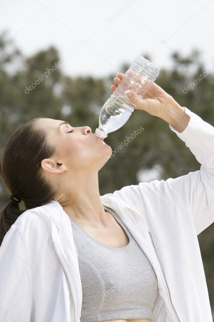 Woman Drinking Mineral Water