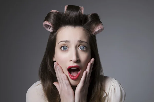 Surprised Young Female With Hair Rollers And Red Lipstick — Stock Photo, Image
