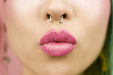 Young woman puckering her lips clipart