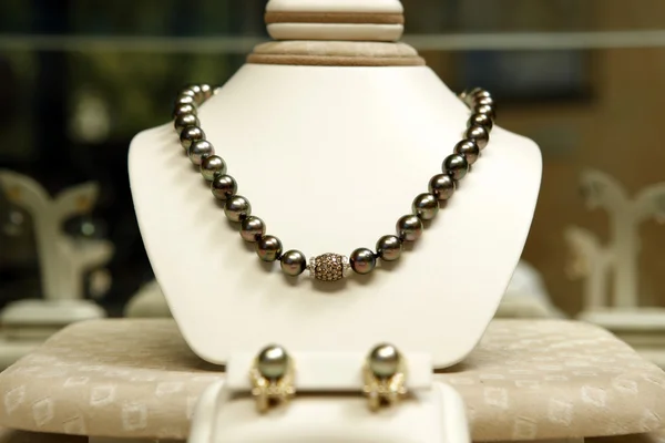 Earrings With Necklace On Display — Stock Photo, Image