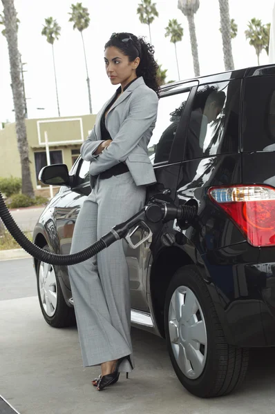 Businesswoman Refueling Car At Station — Stock Photo, Image