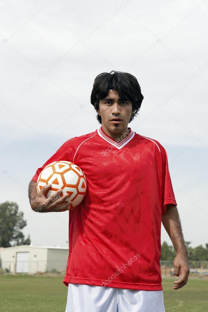 Player Holding A Football