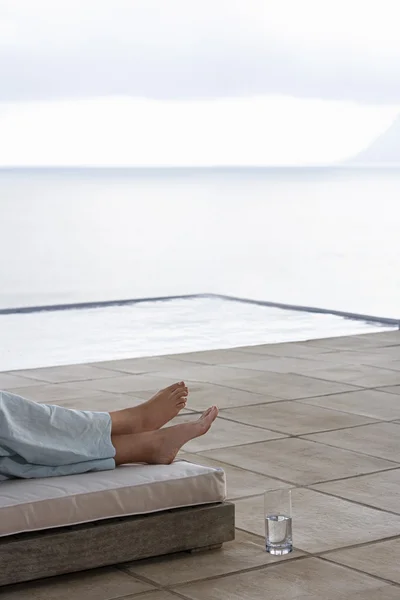 Woman Relaxing On Sun Bed — Stock Photo, Image