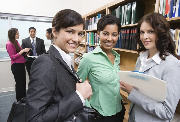 Multiethnic Businesspeople In Library — Stock Photo, Image