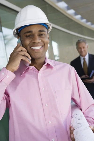 Architect On A Call With Blueprint — Stock Photo, Image